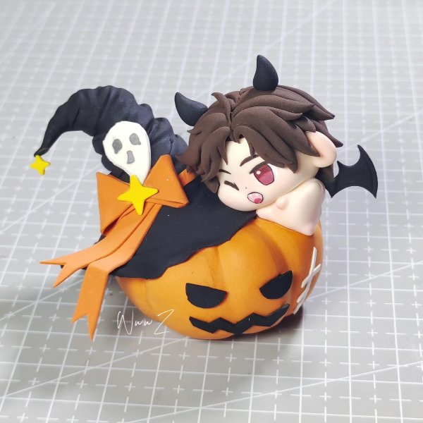 Adorable Clay Pumpkin with Cute Characters