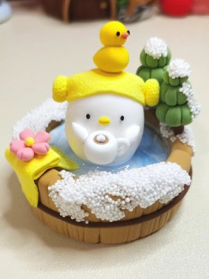 Relaxing Clay Duck Enjoying a Hot Spring