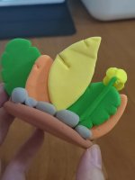 Adorable Clay Duck Engaged in Painting