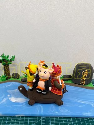 Clay Figurines on a Turtle Scene