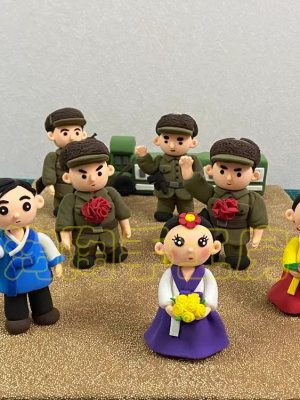 Colorful Clay Figurines with Flowers