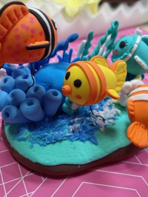 Colorful Clay Fish Scene with Coral