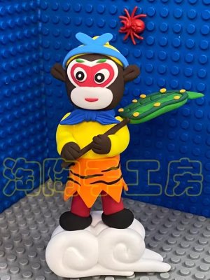 Colorful Clay Monkey Figure with Leaf