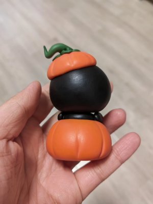 cute-clay-figure-with-pumpkin-elements-3