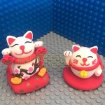 Joyful Clay Cat Figurines with Capes