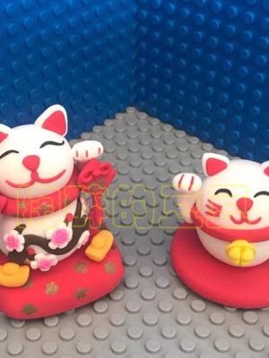 Joyful Clay Cat Figurines with Capes