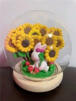 Playful Clay Bunny with Sunflower Garden