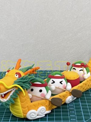 Playful Clay Dragon Boat with Characters