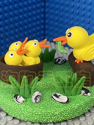 Playful Clay Ducklings with Nest