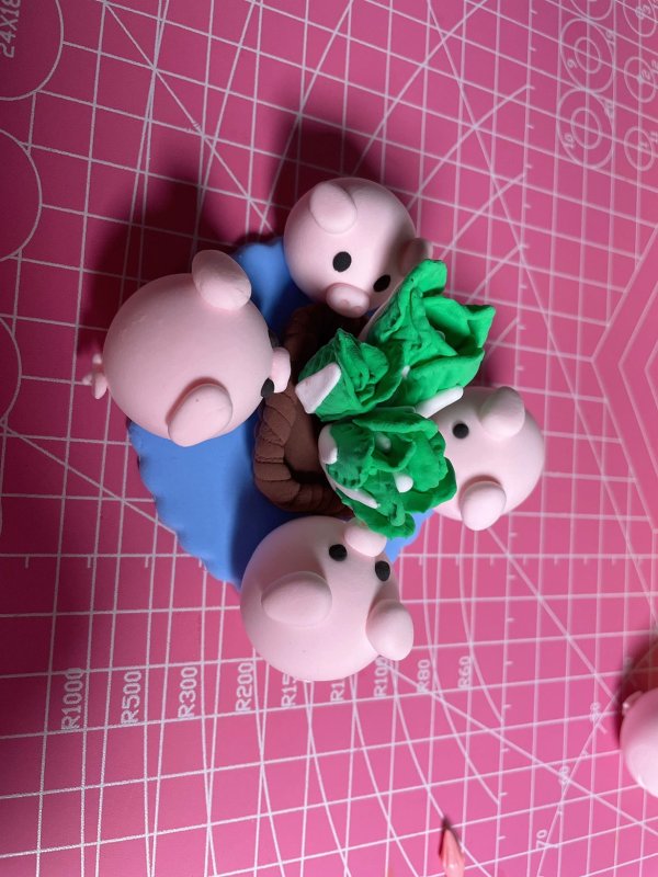 Playful Clay Piglet Scene with Grass