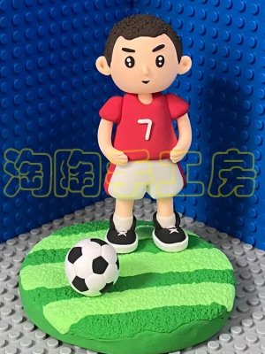 Playful Clay Soccer Player Figurine