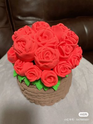 Vibrant Clay Rose Bouquet in Basket