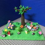 Whimsical Clay Garden Scene with Creatures