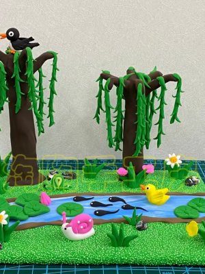 Whimsical Clay Pond Scene with Trees